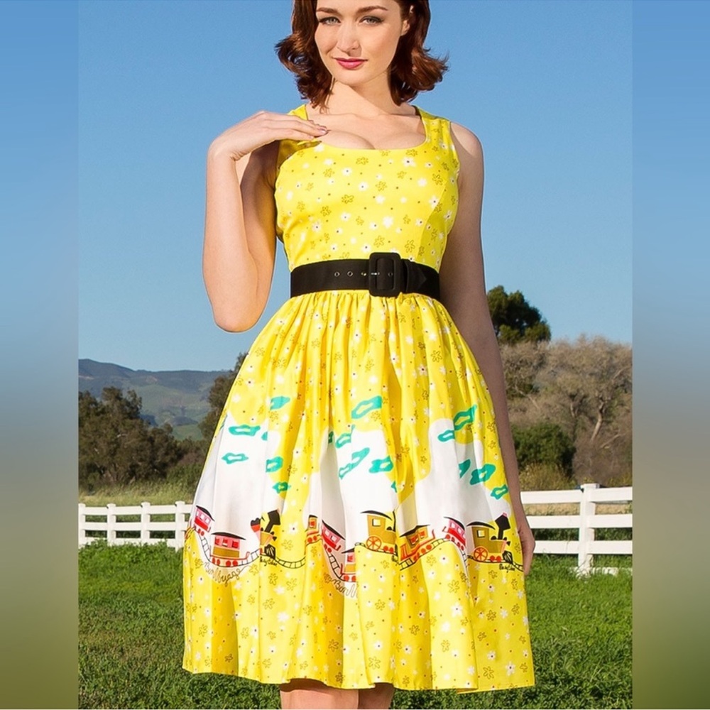 Pinup Girl Clothing Aurora Dress in Mary Blair Yellow Train Print